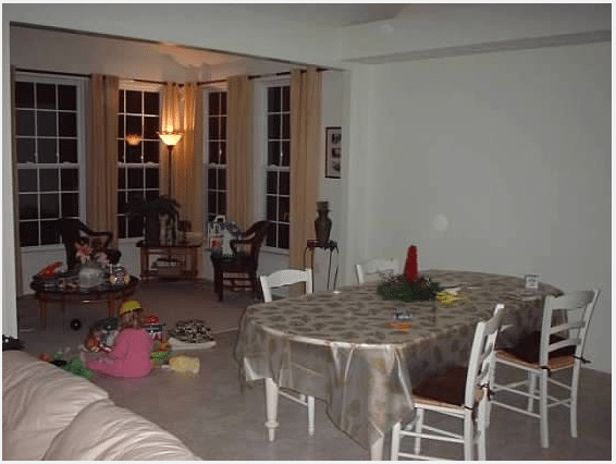 Before: Shortly after we moved in. The table and chairs were my first investment pieces. (I still have them). See my baby girl playing with her "Bob the Builder" hard hat on? That's my girl! :)