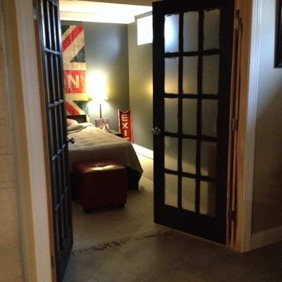 industrial basement guest room after