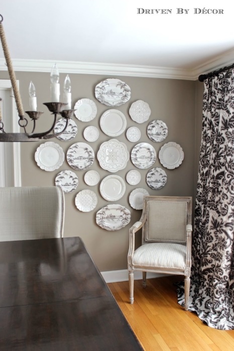 hanging plates on wall dining room with table WM