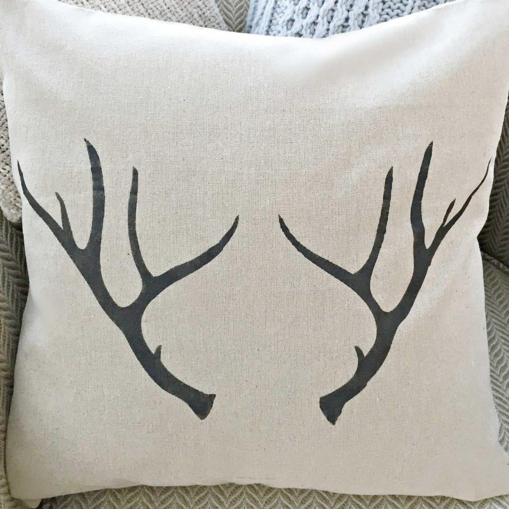 antlers pillow cover with hand drawn design by snazzy little things