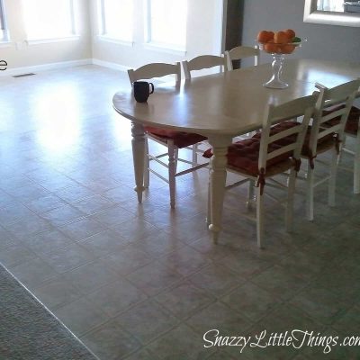 DIY Laminate Floor Installation {Budget} Tutorial - by SnazzyLittleThings.com