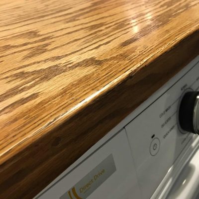 Tiny Laundry Room Update Faux Butcher Block Made of Plywood by SnazzyLittleThings.com