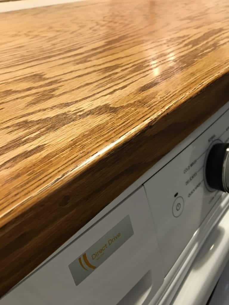 Tiny Laundry Room Update Faux Butcher Block Made of Plywood by SnazzyLittleThings.com