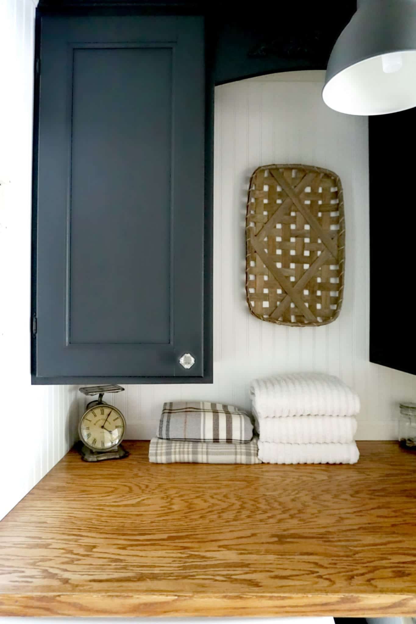 Farmhouse Laundry Room Makeover Black Cabinets Tobacco Basket