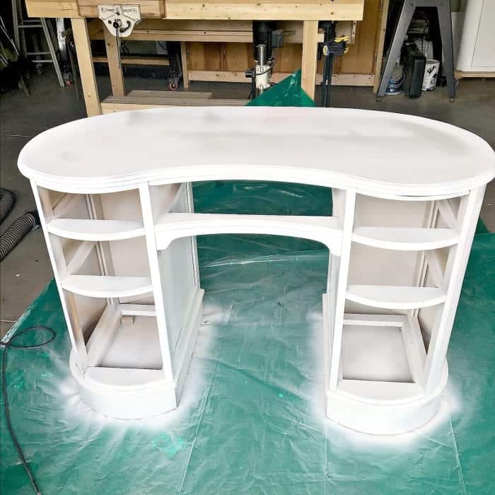 Kidney Shaped Desk Makeover Sprayed with Primer