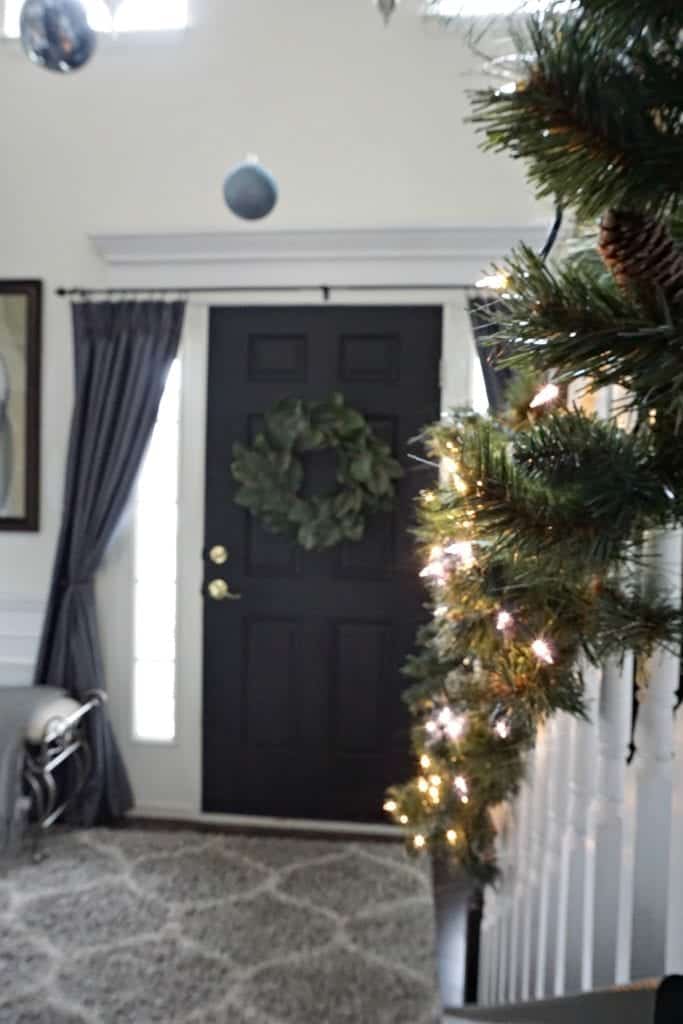 Modern Rustic Holiday Home Tour 2017 Close up of banister with lights