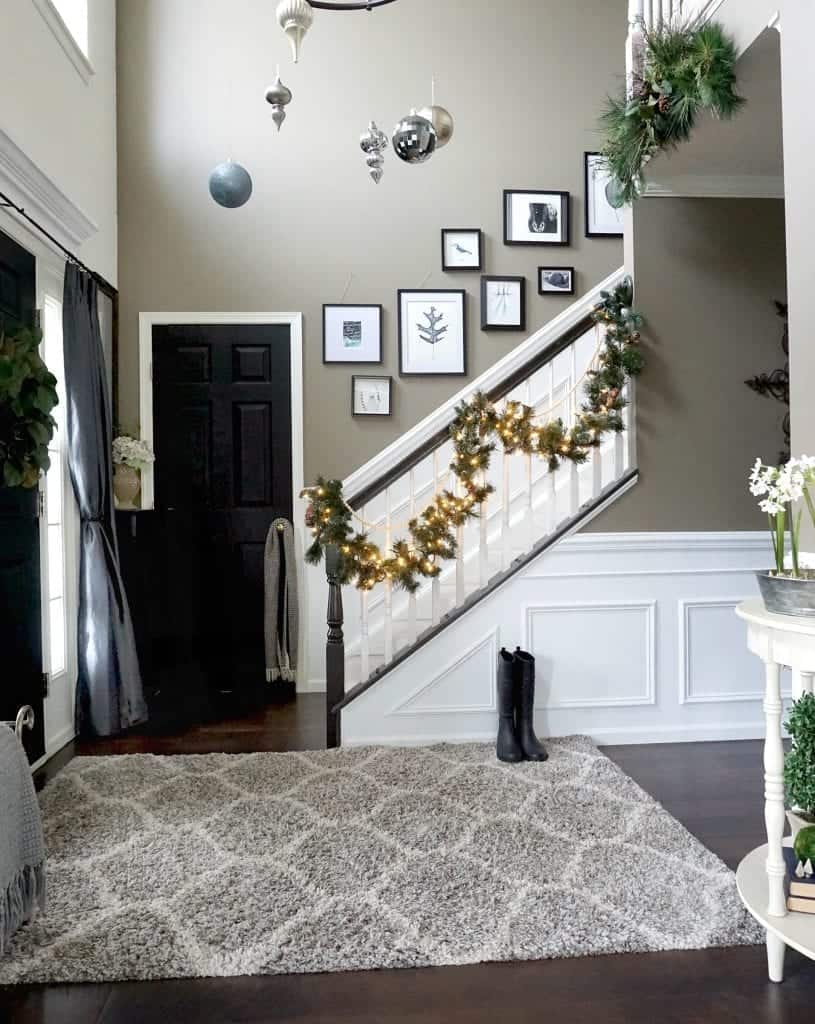 Modern Rustic Holiday Home Tour 2017 Foyer with Rug and Ornaments