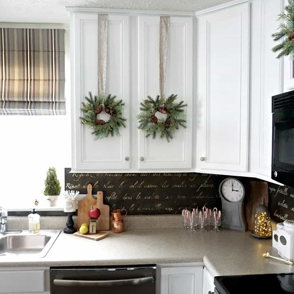 Modern Rustic Holiday Home Tour 2017 Kitchen Partial View of Cabinets and stenciled backsplash