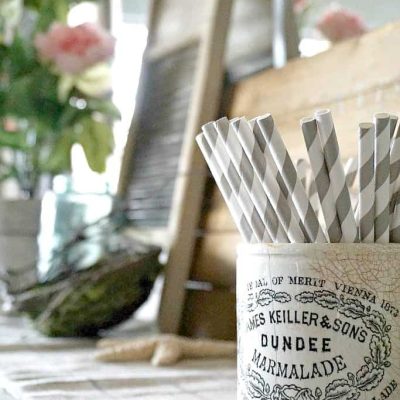 old crock with straws