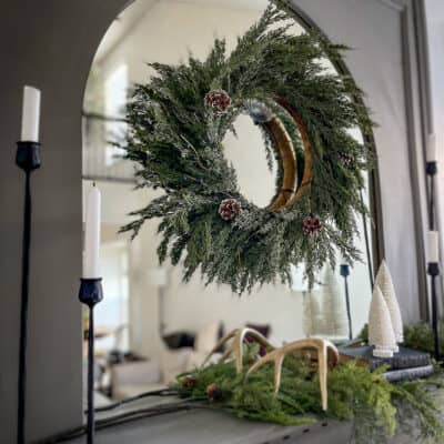 DIY arch over our mantel mirror