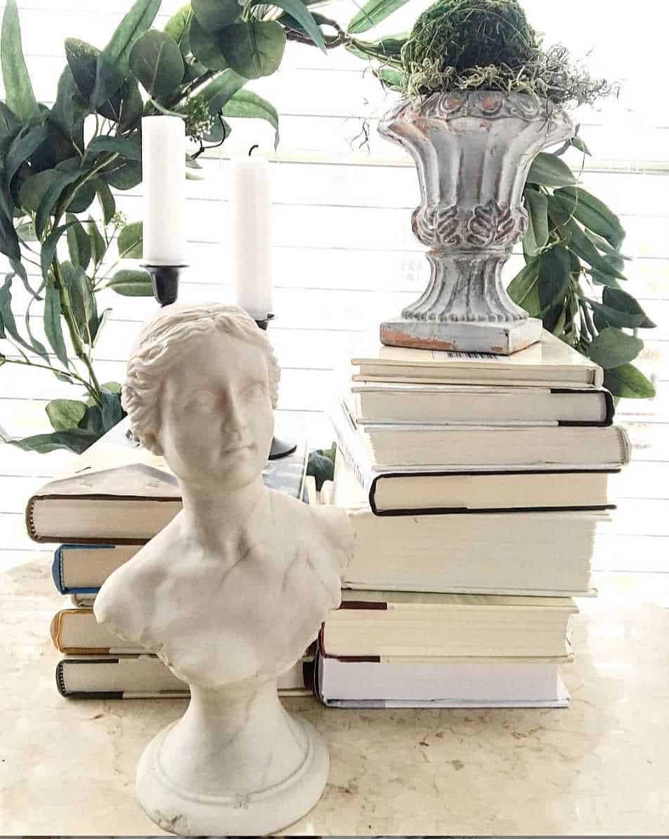 Thrifted Vintage Statue with Old Books, Old Candlesticks, Wreath