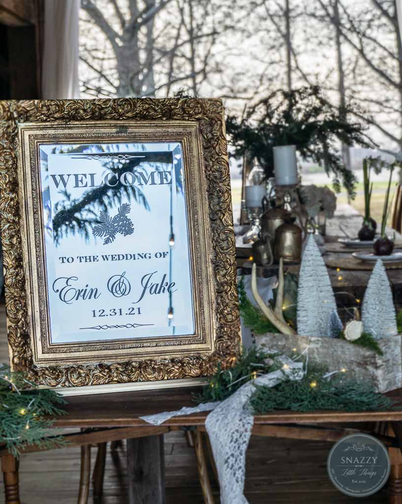 winter wedding decor ideas vintage mirror with white lettering