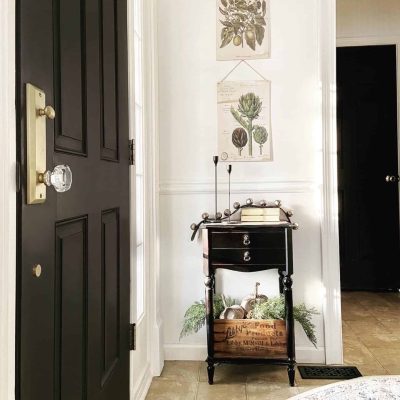 Black door with brass handle interior foyer modern classic